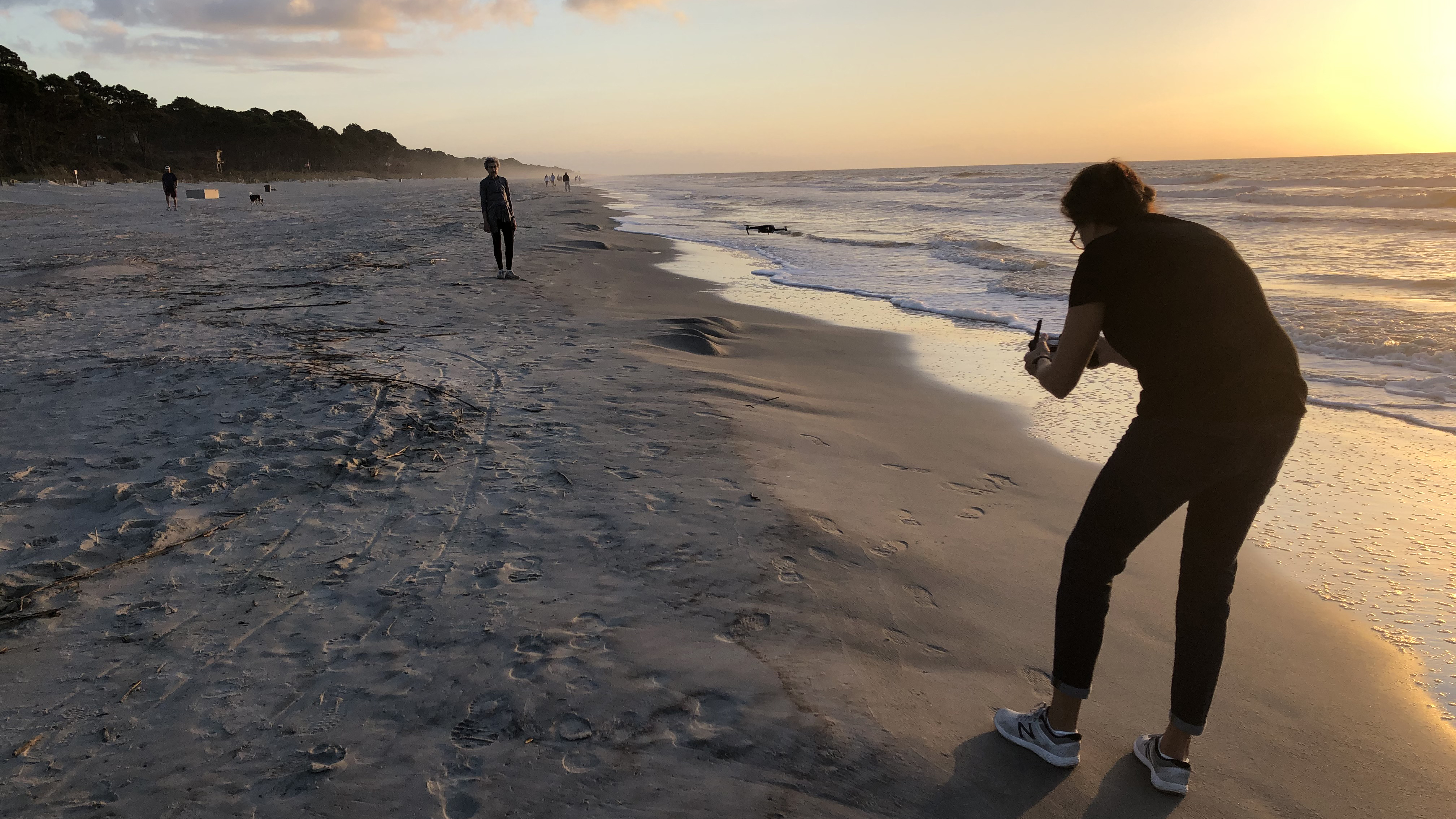 A behind-the-scenes shot of videographer Simone Keith filming Aldwyth on the beach near her Lowcountry South Carolina home. (Photo credit: Olympia Stone)